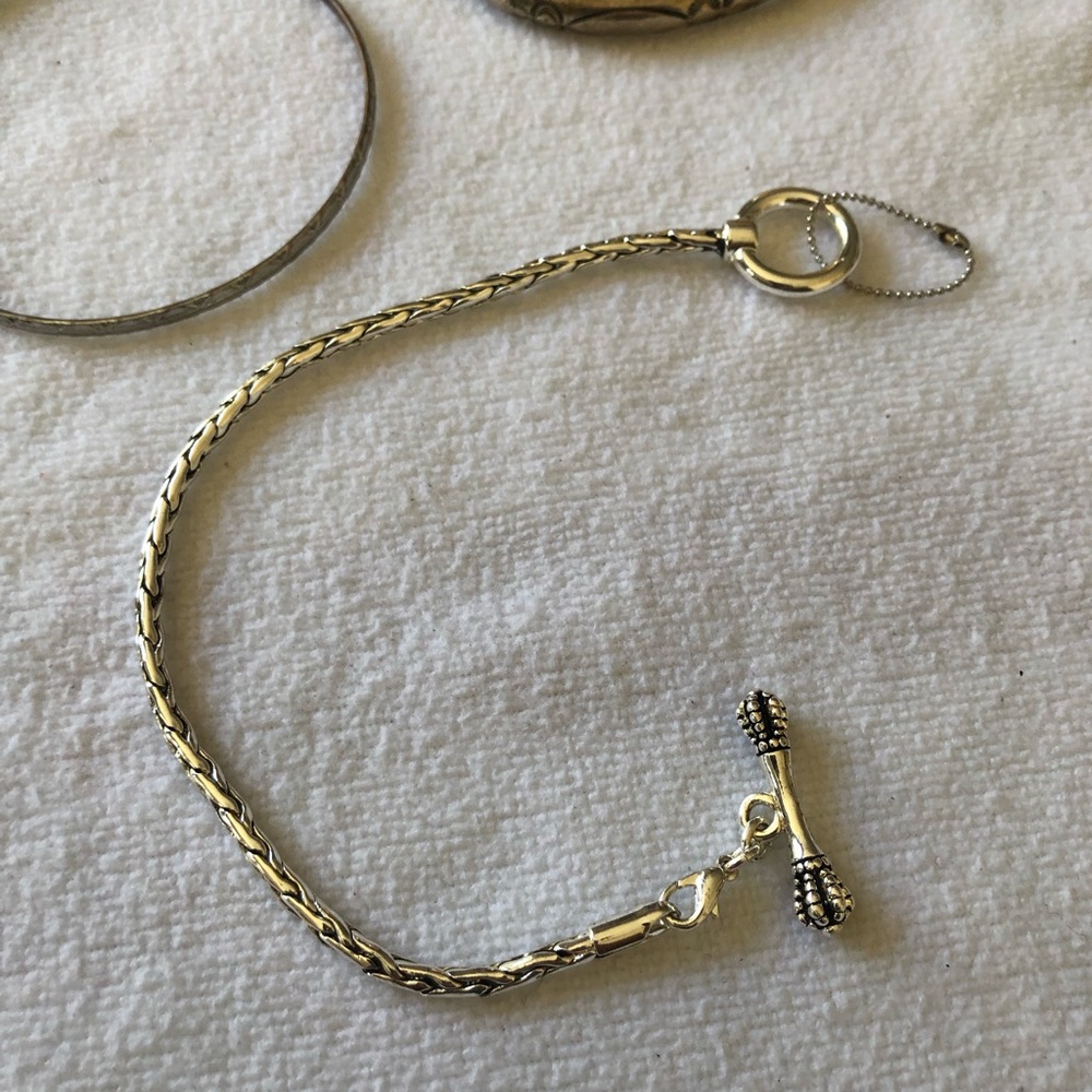 3 silver Bracelets, one cuff, one bangle, and one clasp. Great deal